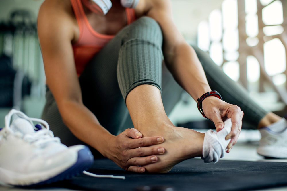 closeup-athletic-woman-injured-her-foot-during-workout-gym.jpg