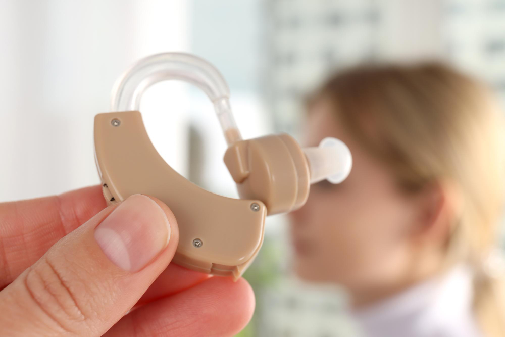 concept-health-care-with-hearing-aid-close-up.jpg